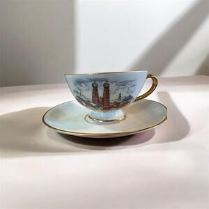pmr bavaria jaeger co germany tea cup and saucer city theme, gold.